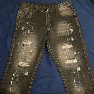 Distressed Black Jeans with Paint Splatter